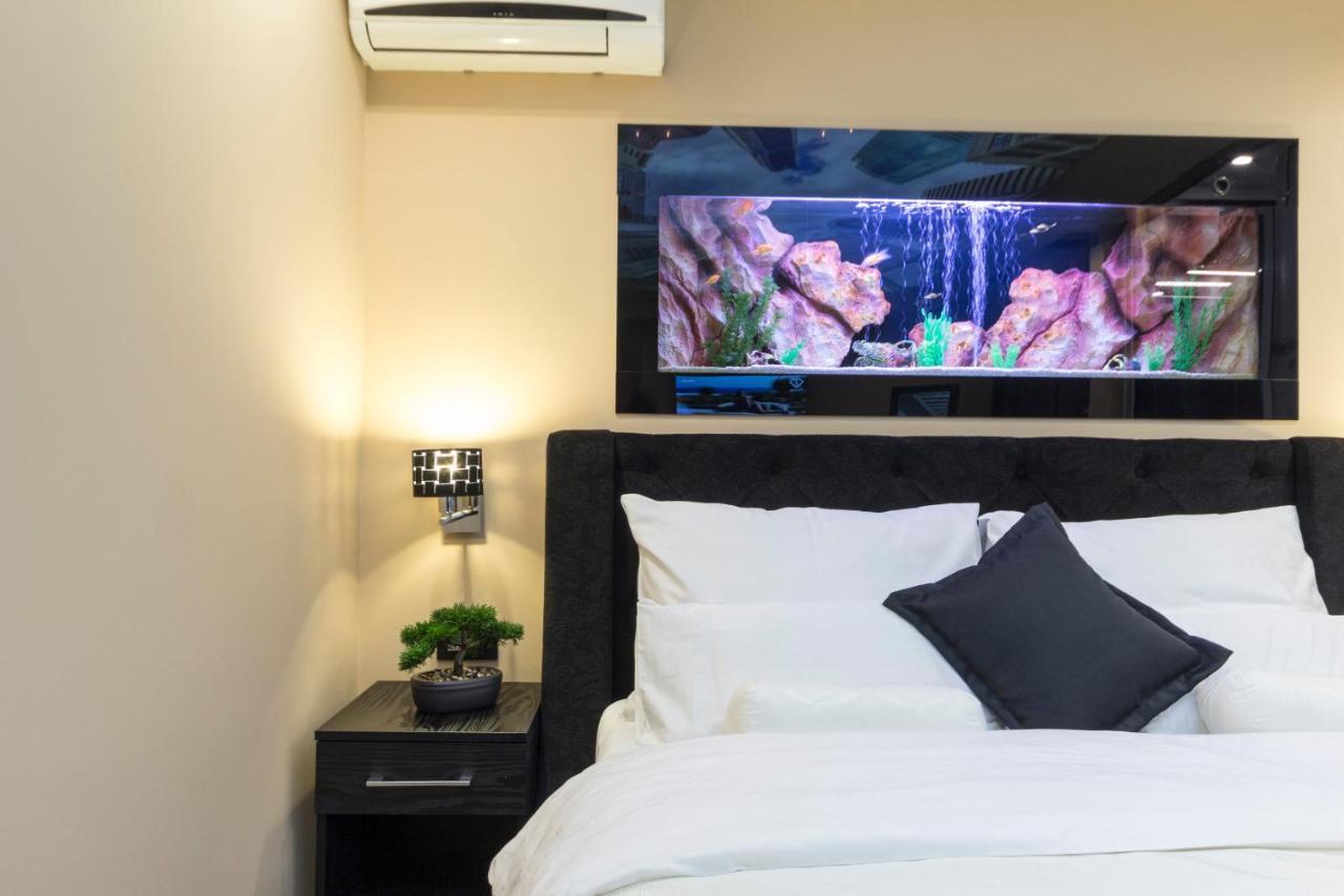 Madison Inn Suites - Wilson'S Square Beograd Bagian luar foto